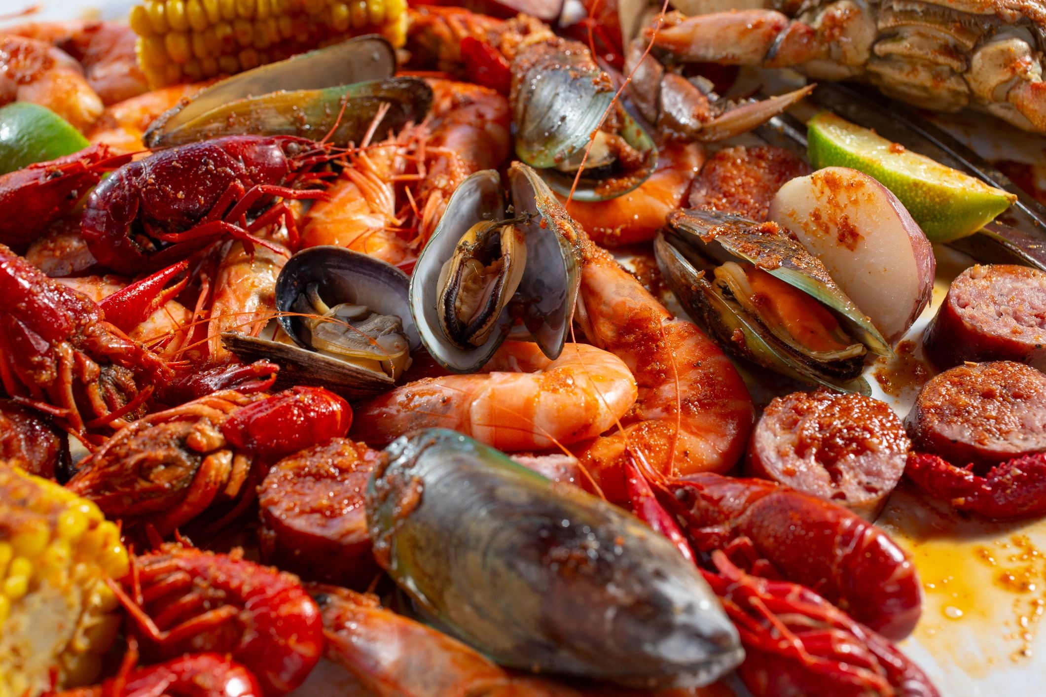 Mixed seafood combo with lobster, shrimp, and mussels